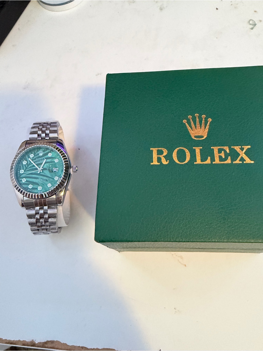 Rolex Silver Bracelet Watched With Green Dial And Blue Dial
